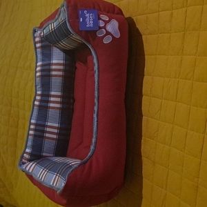 Red,white and blue  plaid dog be